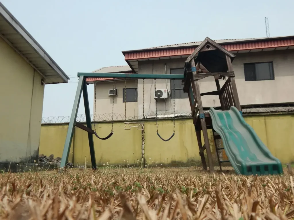 blue and brown wooden swing