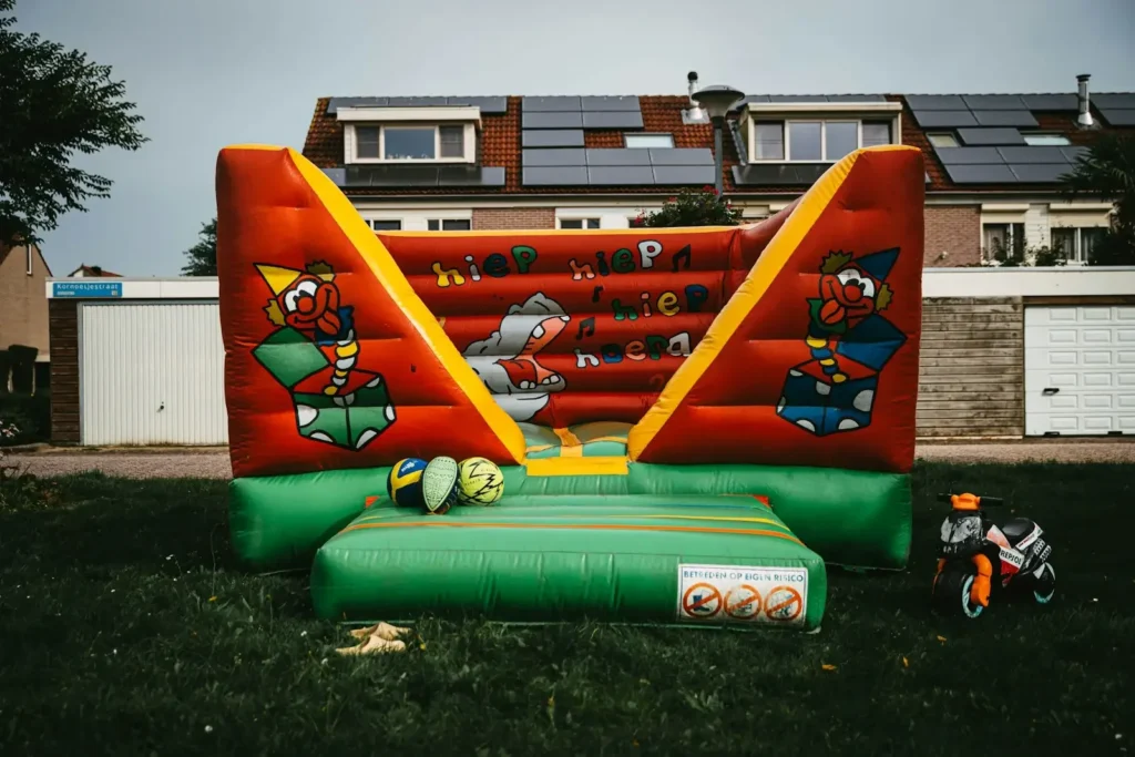 a large inflatable bouncer in a yard